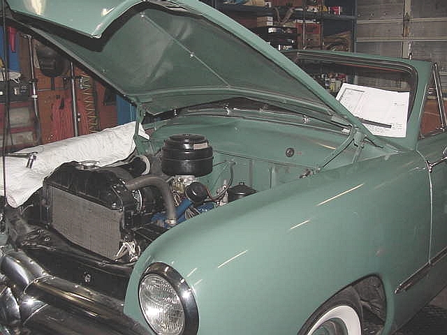 49 Ford under hood adjusted